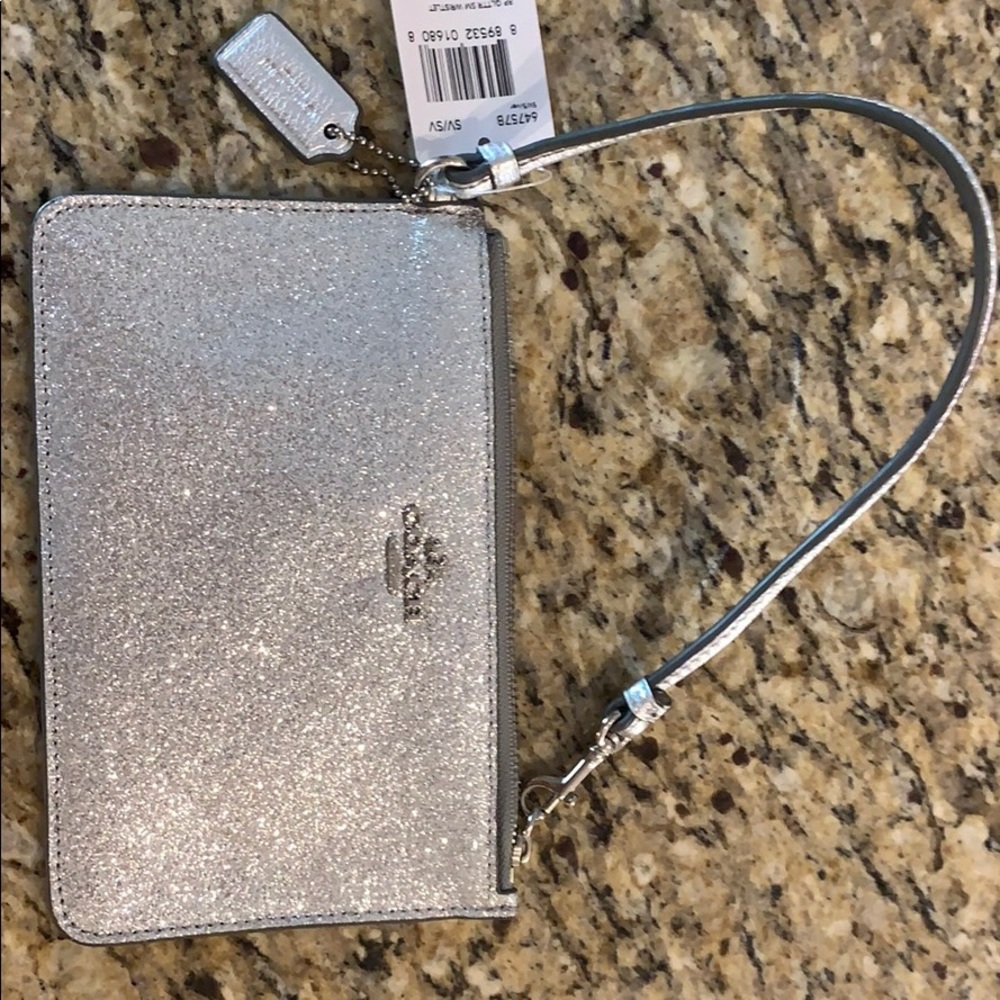 Coach- NWT. Wristlet. Great for a night out.